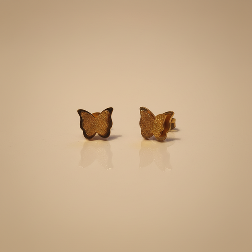 Boucles d'oreilles acier inoxydable motif papillon brillants.