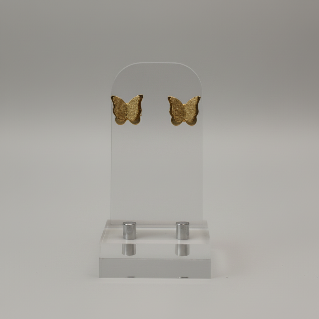Boucles d'oreilles acier inoxydable motif papillon brillants.