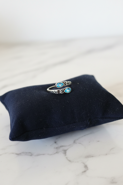 Bague acier inoxydable argenté avec ocydes de zirconium teintés bleu ajustable