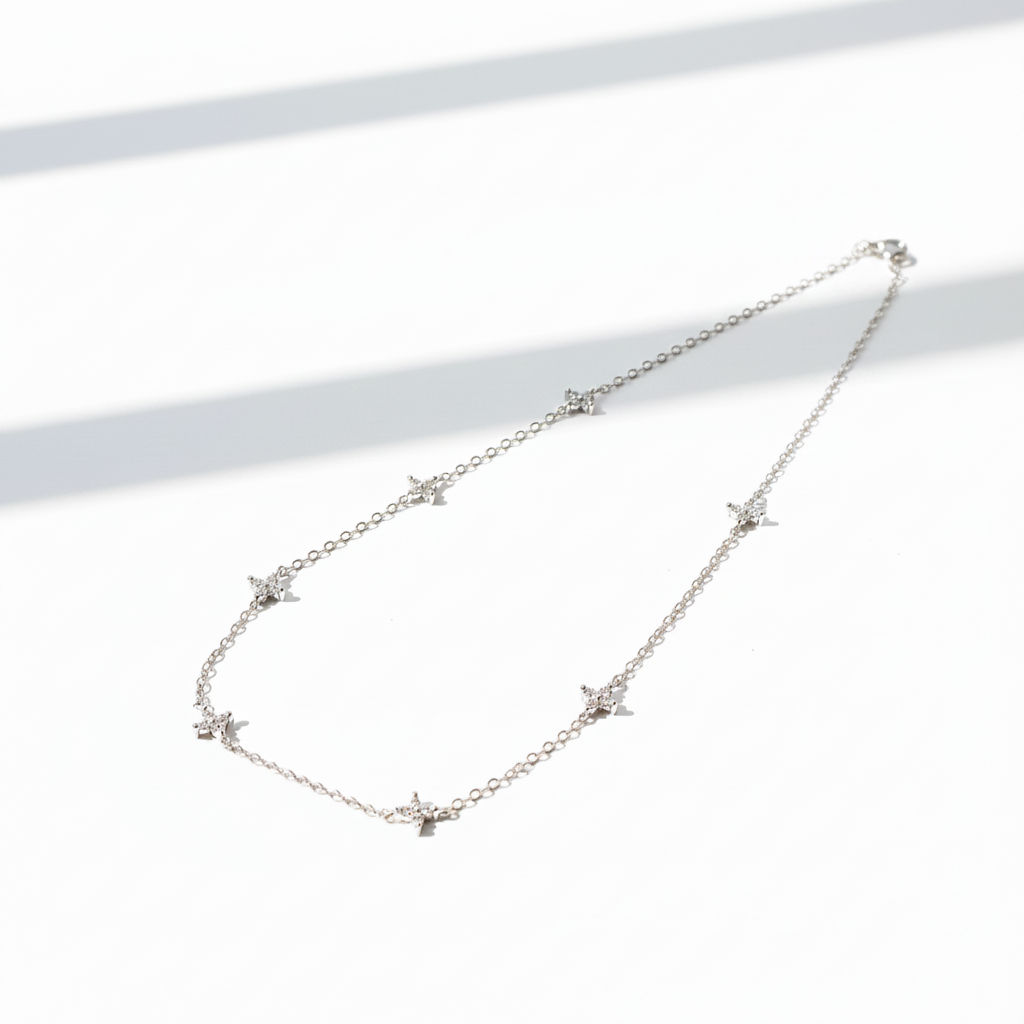 collier acier inoxydable avec petits motifs ajustable 45 cms de longueur ajustable