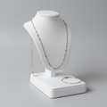 Parure bijoux acier inoxydable doré avec avec petites perles multicolores ajustable
