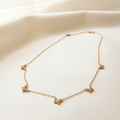 Collier acier inoxydable doré motif papillon et oxydes de zirconium blancs 45 cms de longueur réglable
